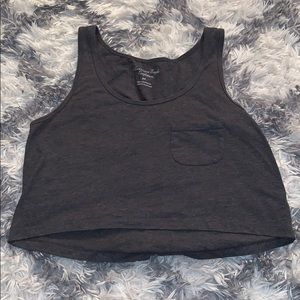 Charcoal grey tank crop top with left side pocket